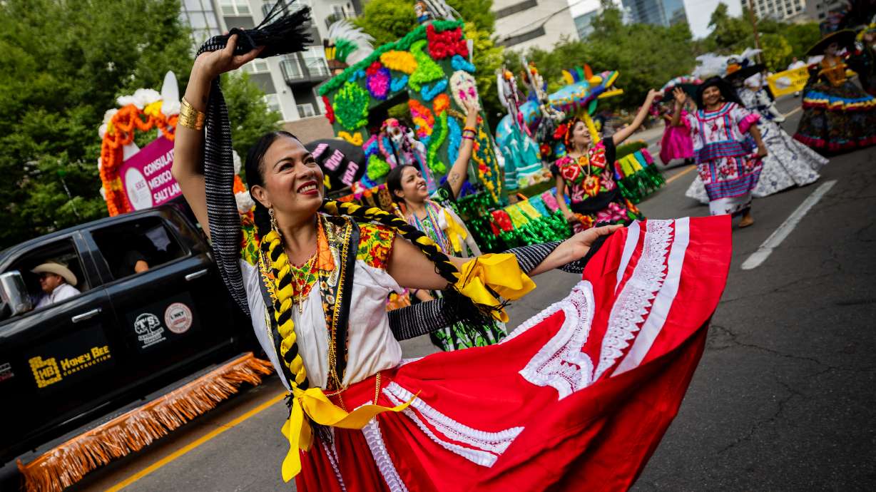 People from the Consulate of Mexico float move through the Days of '47 Parade in Salt Lake City on Thursday.