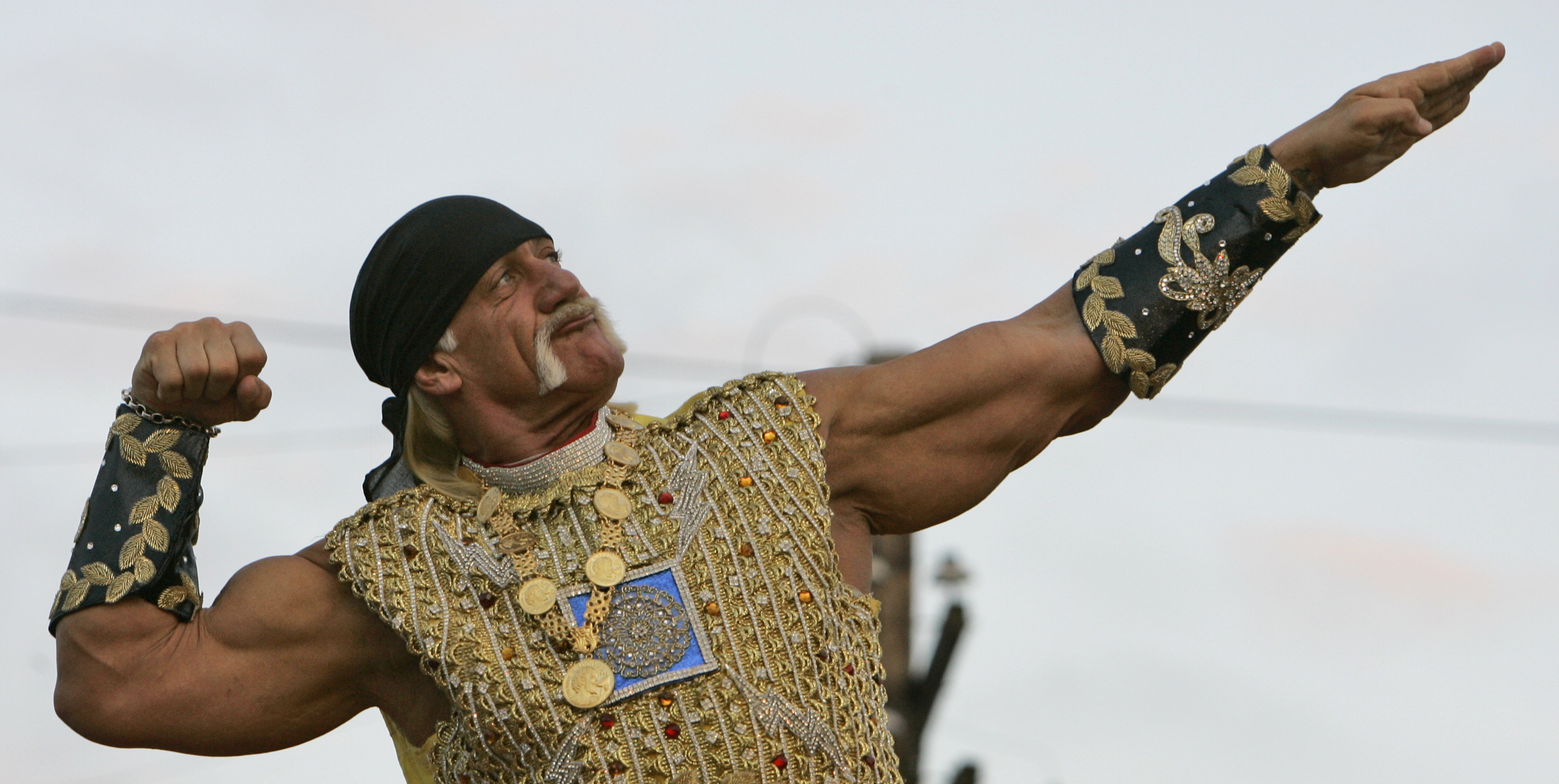 FILE - Actor Hulk Hogan poses on his float during the Krewe of Bacchus Mardi Gras parade in New Orlean, Feb. 3, 2008, the weekend before Fat Tuesday. 