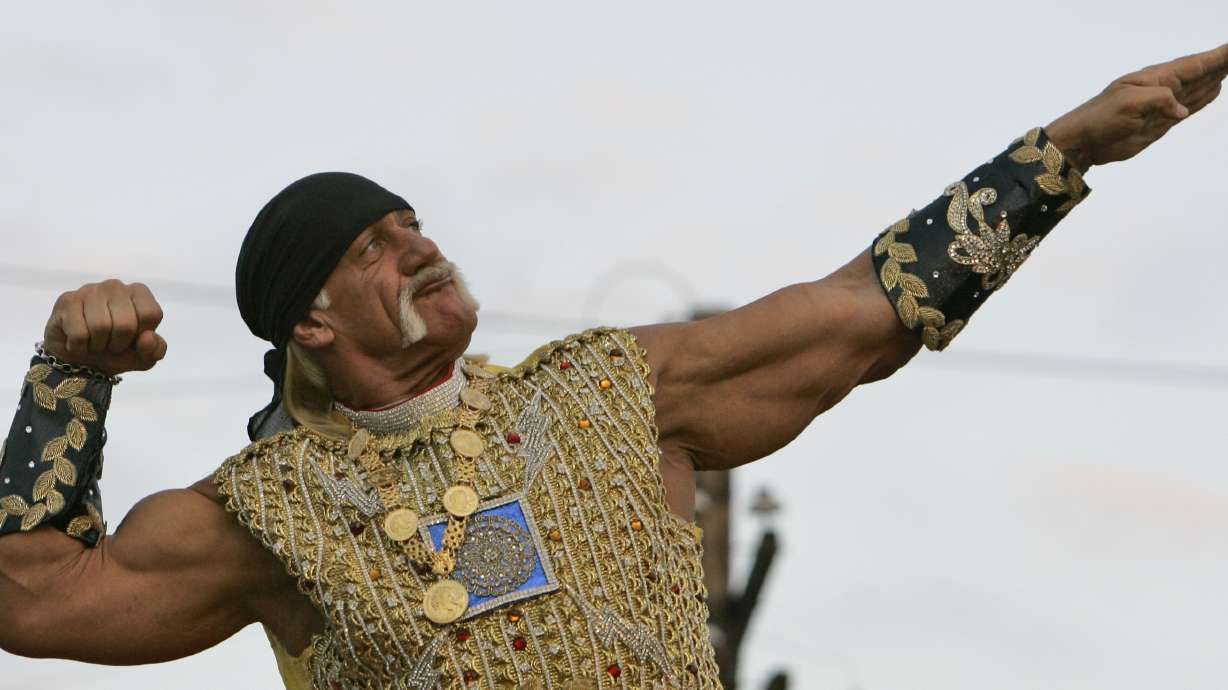 FILE - Actor Hulk Hogan poses on his float during the Krewe of Bacchus Mardi Gras parade in New Orlean, Feb. 3, 2008, the weekend before Fat Tuesday.