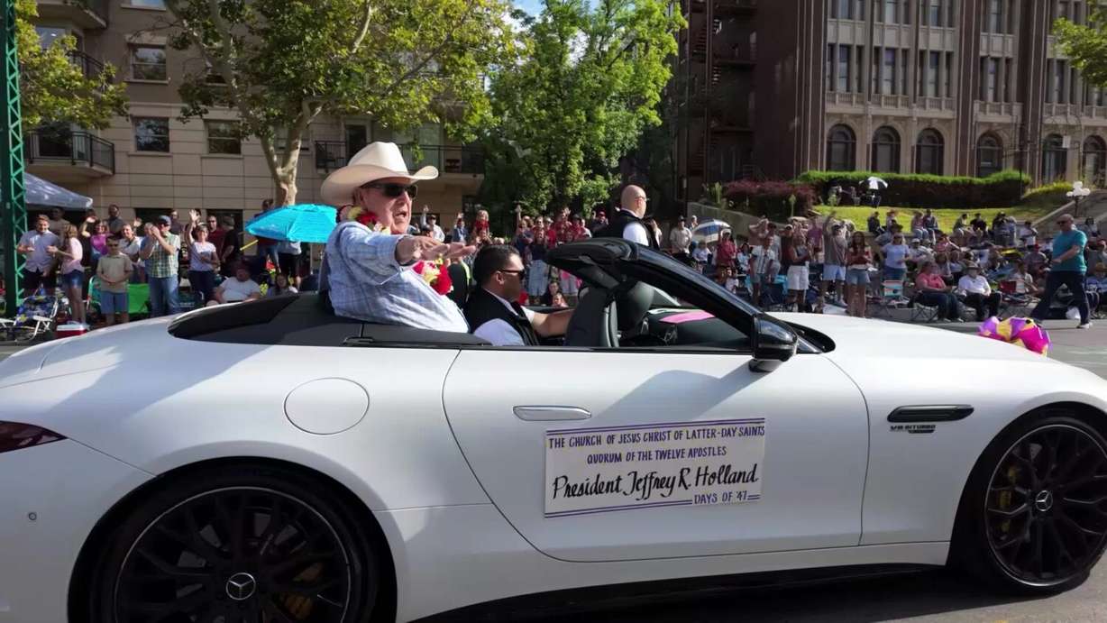 President Jeffrey Holland, acting president of the Quorum of the Twelve Apostles of The Church of Jesus Christ of Latter-day Saints, rides in the motorcade during the Days of ’47 Parade on Thursday. President Holland served as the parade's grand marshal.