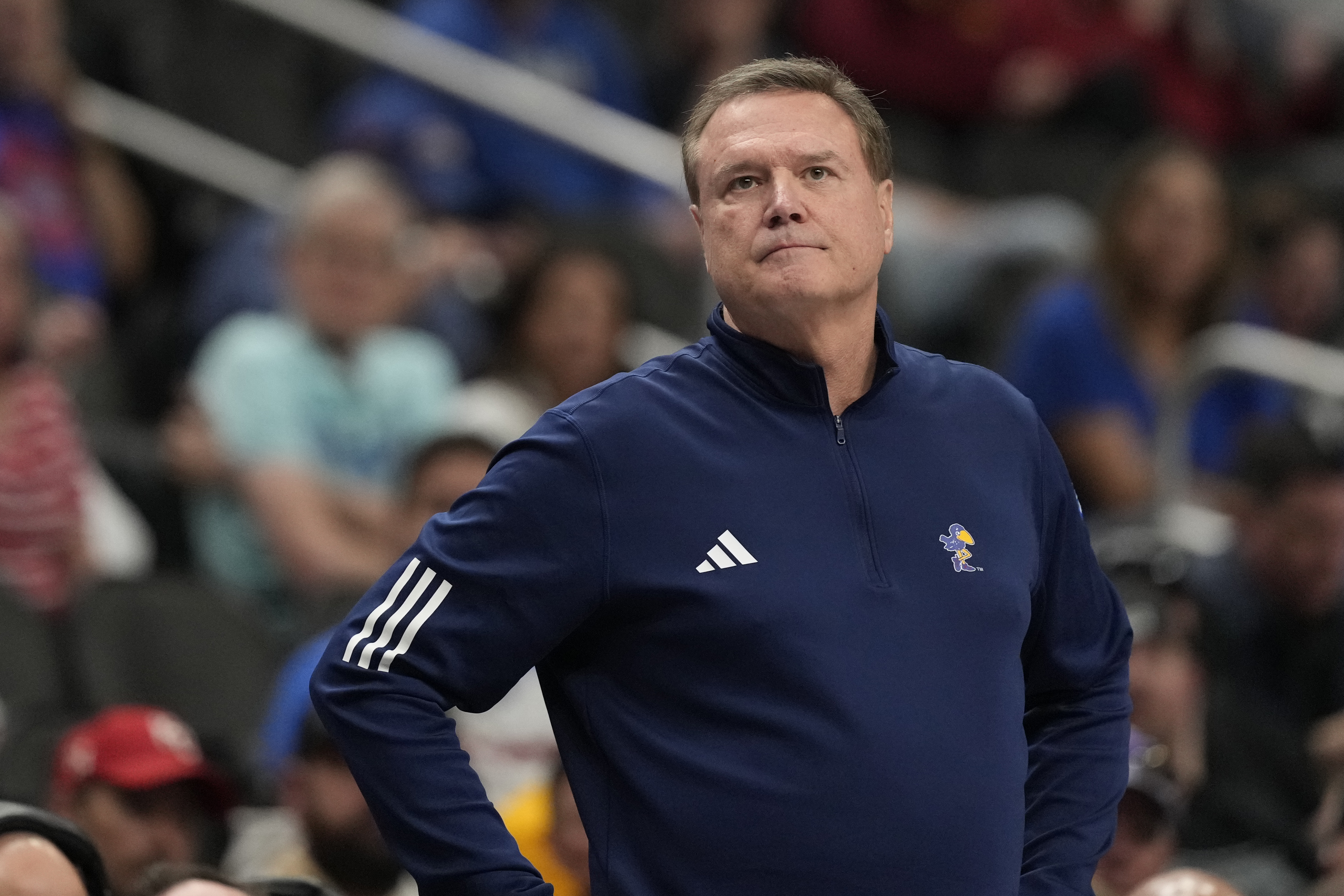 FILE - Kansas head coach Bill Self is seen on the sidelines during the second half of an NCAA college basketball game against UCF in the second round of the Big 12 Conference tournament, March 12, 2025, in Kansas City, Mo.