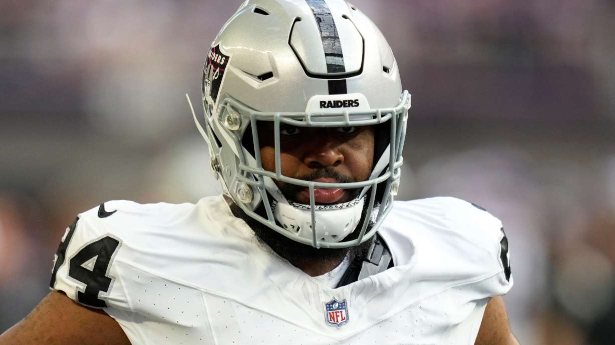 FILE - Las Vegas Raiders defensive tackle Christian Wilkins (94) warms up before an NFL preseason football game against the Minnesota Vikings, Saturday, Aug. 10, 2024, in Minneapolis.