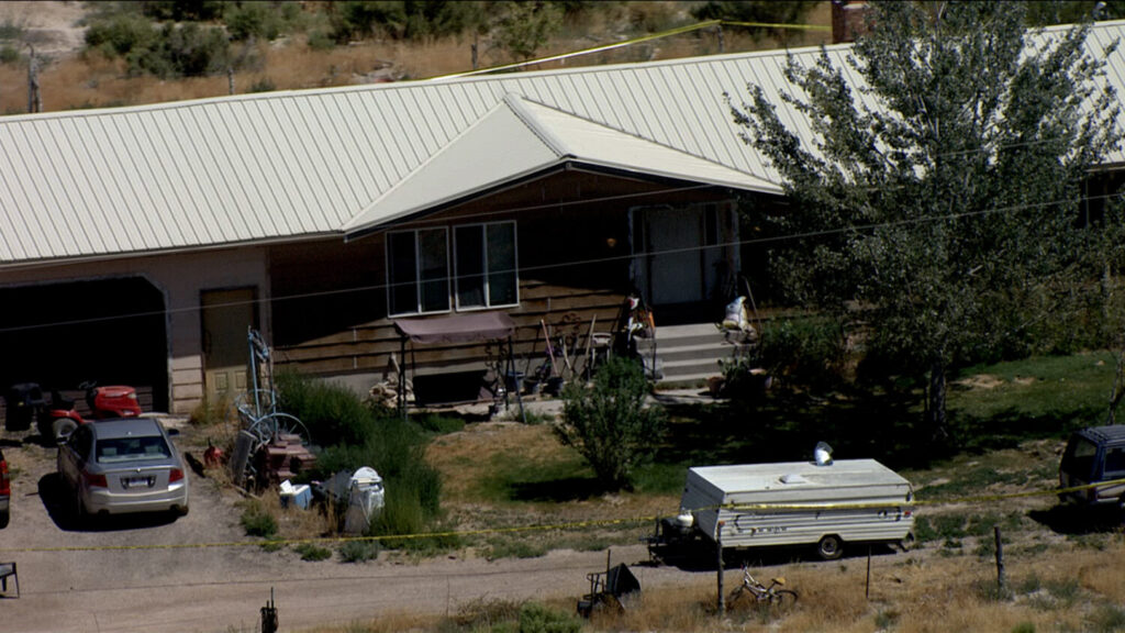 A house in Flowell, Millard County, is seen by Chopper 5 on Friday after authorities found three bodies at the house the previous evening.