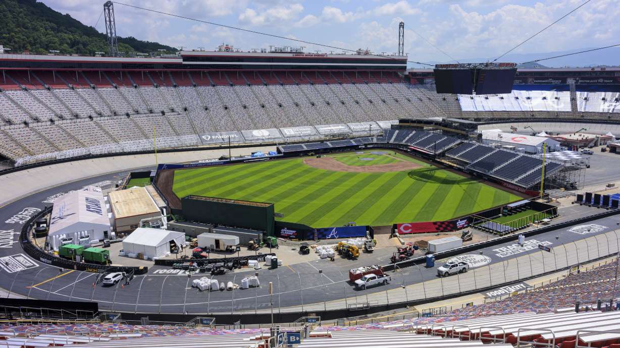 Work continues on the baseball field inside the racetrack at Bristol Motor Speedway, Friday, July 25, 2025, in Bristol, Tenn., for MLB Speedway Classic baseball game between the Cincinnati Reds and Atlanta Braves on Aug. 2. (Earl Neikirk/Bristol Motor Speedway via AP