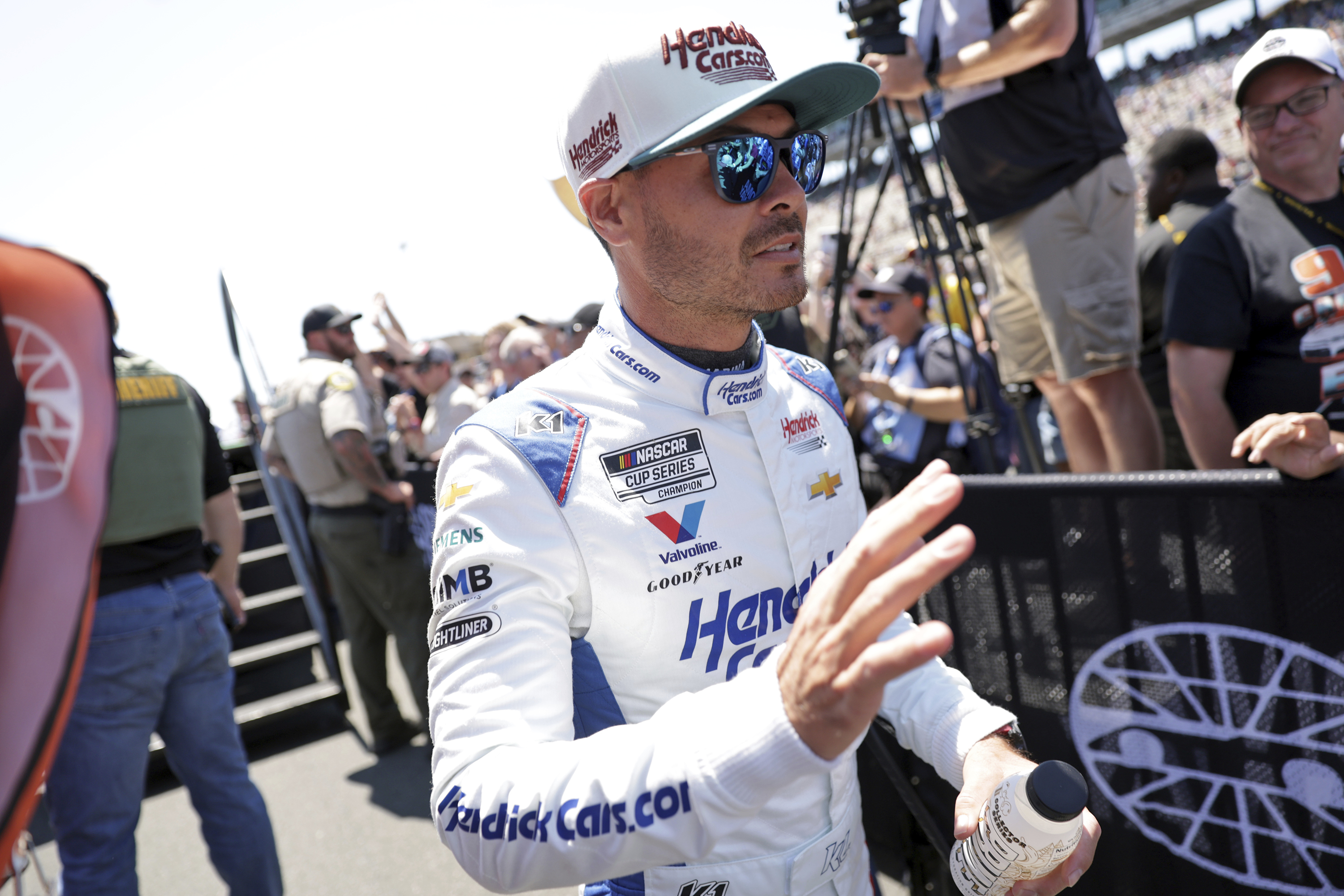Kyle Larson waves at fans after being introduced before a NASCAR Cup Series auto race at Sonoma Raceway in Sonoma, Calif., Sunday, July 13, 2025. 