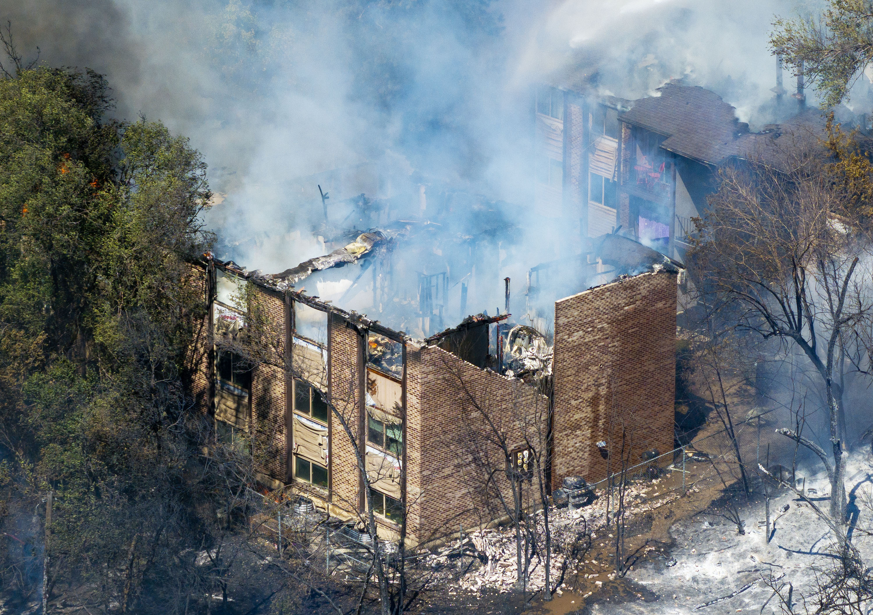 A large fire in the Millcreek area destroyed two apartment buildings on Friday. Salt Lake City leaders said Monday they are cooperating with fire investigators in relation to the fire, which began on land owned by Salt Lake City.