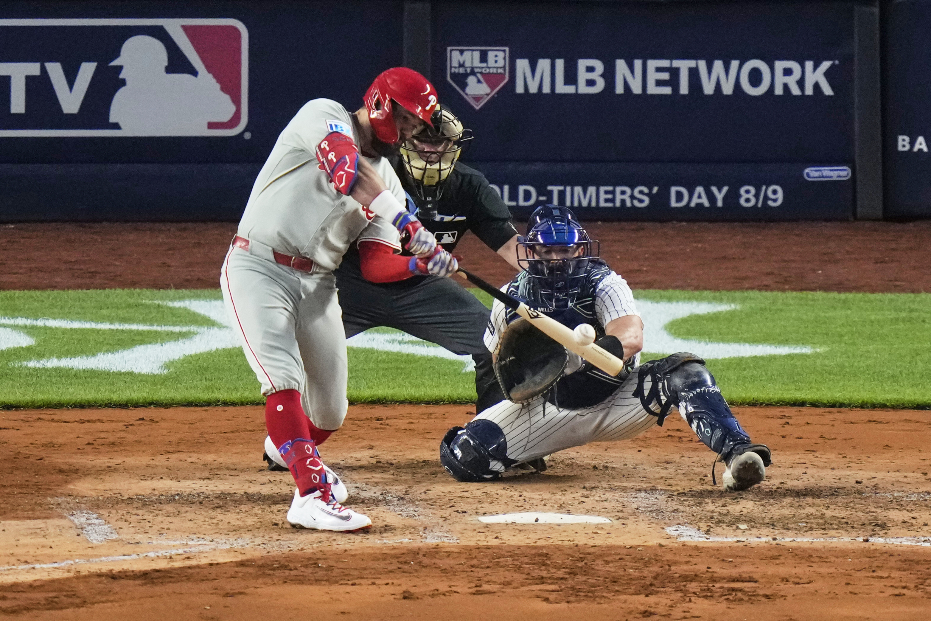 Philadelphia Phillies' Kyle Schwarber hits a two-run home run during the fifth inning of a baseball game against the New York Yankees Friday, July 25, 2025, in New York.