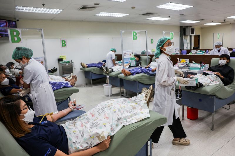 People donate blood in Bangkok, Thailand, Friday. Thailand's acting prime minister said they had agreed to a ceasefire in principle with Cambodia, but wanted to see "sincere intention" from the Cambodians.