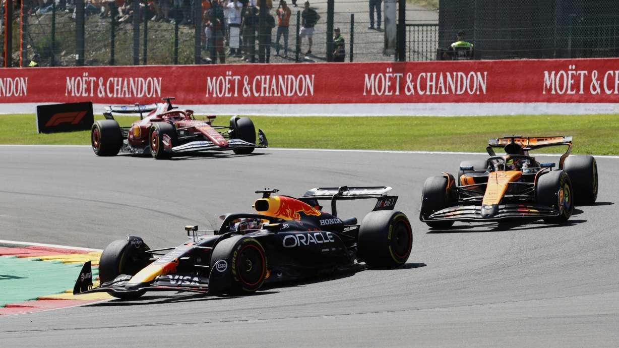 Red Bull driver Max Verstappen of the Netherlands, left, steers his car during the sprint race ahead of the Formula One Grand Prix at the Spa-Francorchamps racetrack in Spa, Belgium, Saturday, July 26, 2025.