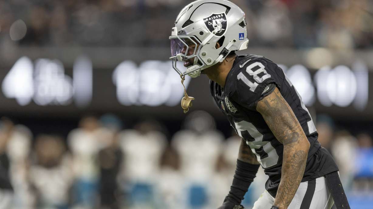 Las Vegas Raiders cornerback Jack Jones (18) lines up against the Jacksonville Jaguars in an NFL football game, Sunday, Dec. 22, 2024, in Las Vegas.