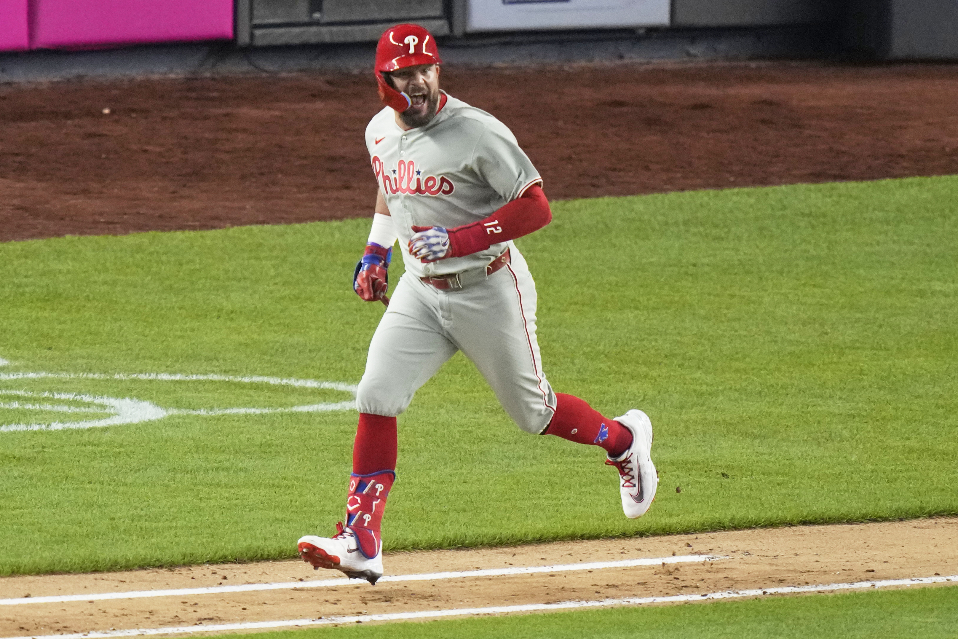 Philadelphia Phillies' Kyle Schwarber celebrates as he runs for a single during the seventh inning of a baseball game against the New York Yankees Friday, July 25, 2025, in New York. 