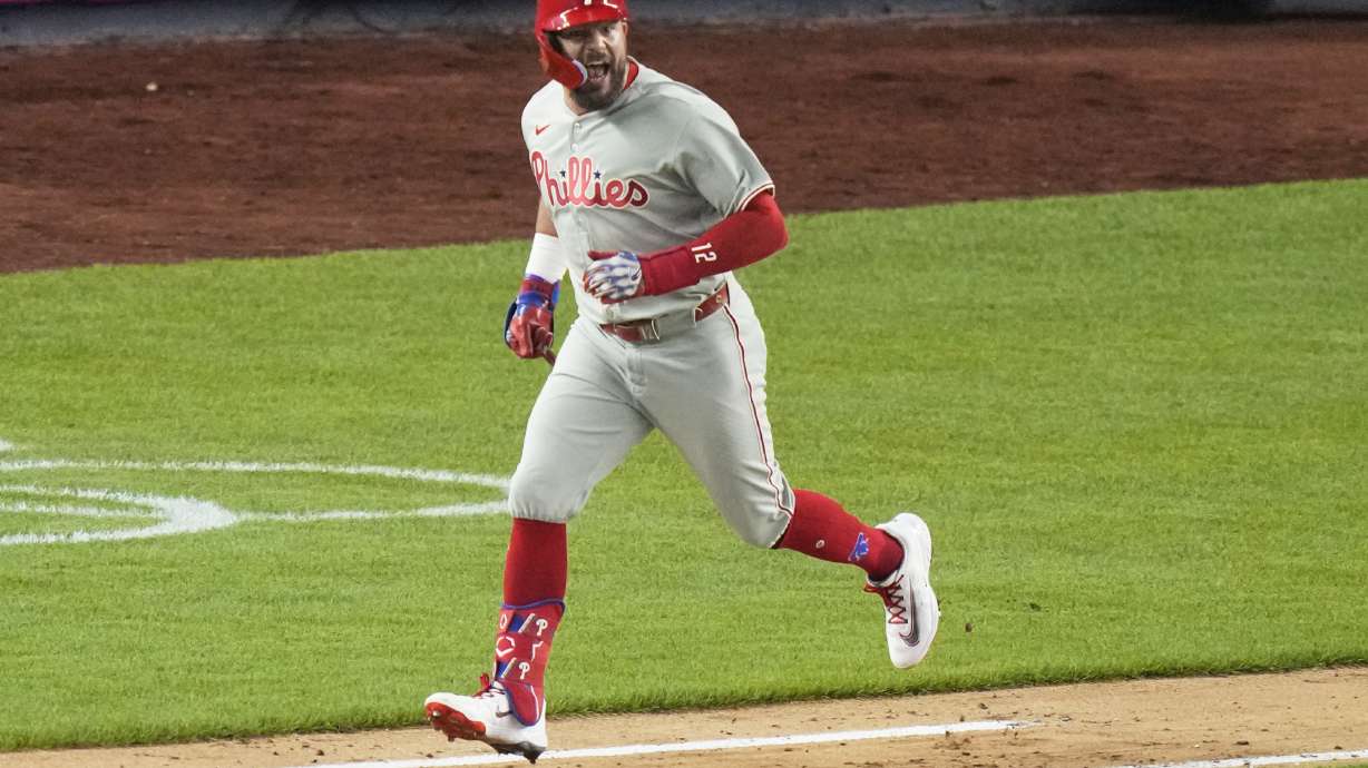 Philadelphia Phillies' Kyle Schwarber celebrates as he runs for a single during the seventh inning of a baseball game against the New York Yankees Friday, July 25, 2025, in New York.