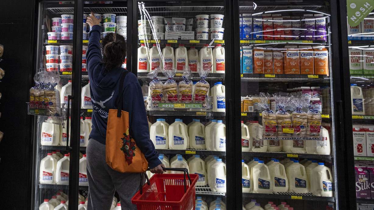 A shopper reaches for cottage cheese in San Francisco, California, in May 2022. For years, cottage cheese was overlooked. But recently, young consumers have turned the lumpy cheese into an internet sensation
