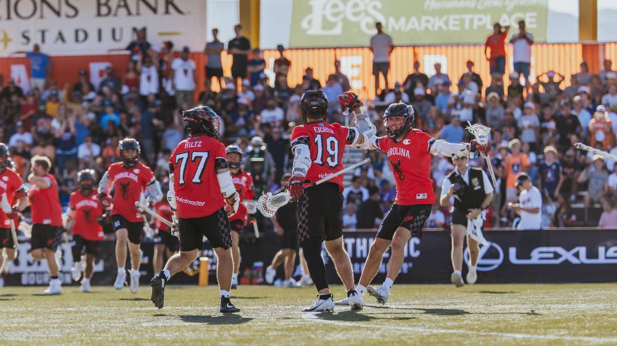 The Carolina Chaos celebrate Jackson Eicher's game-winning goal in a 15-14 overtime win over the Philadelphia Waterdogs during a Premier Lacrosse League match, Saturday, July 26, 2025 at Zions Bank Stadium in Herriman, Utah.