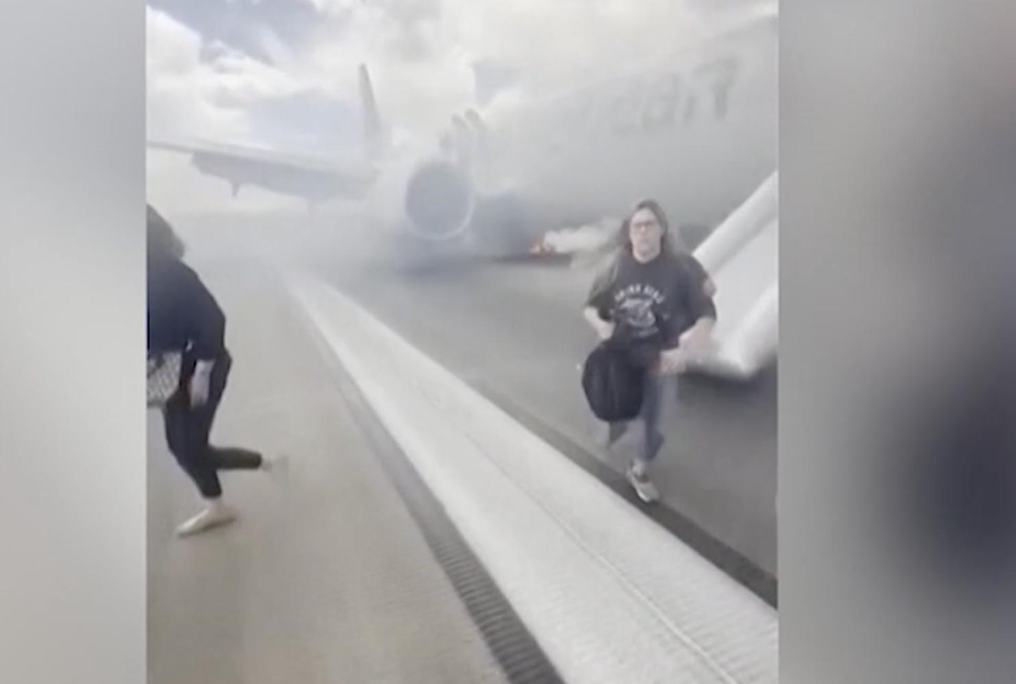 More than 150 passengers on an American Airlines flight departing from Denver International Airport Saturday were evacuated onto the runway after a "possible landing gear incident" left one person injured and sparked a fire, according to the FAA.