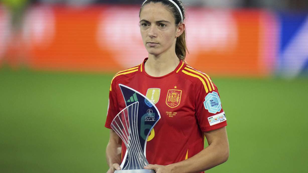 Spain's Aitana Bonmati poses with the "Best Player" of the tournament award at the end of the Women's Euro 2025 final soccer match between England and Spain at St. Jakob-Park in Basel, Switzerland, Sunday, July 27, 2025.