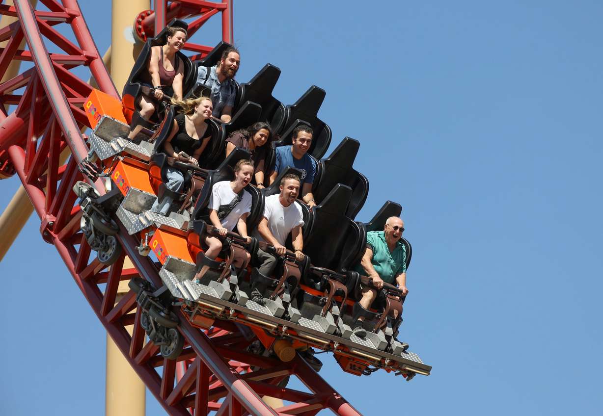 Haroutioun Arslanian, front row in green, takes his 83rd ride of the season on the Cannibal roller coaster at Lagoon Amusement Park in Farmington on July 11. Arslanian, 89, frequents the Cannibal.