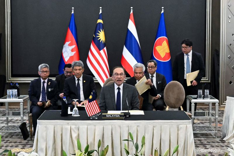 Malaysia's Prime Minister Anwar Ibrahim speaks as he takes part in mediation talks on the Thailand–Cambodia border conflict between Cambodia's Prime Minister Hun Manet and Thailand's acting Prime Minister Phumtham Wechayachai, in Putrajaya, Malaysia,  Monday.