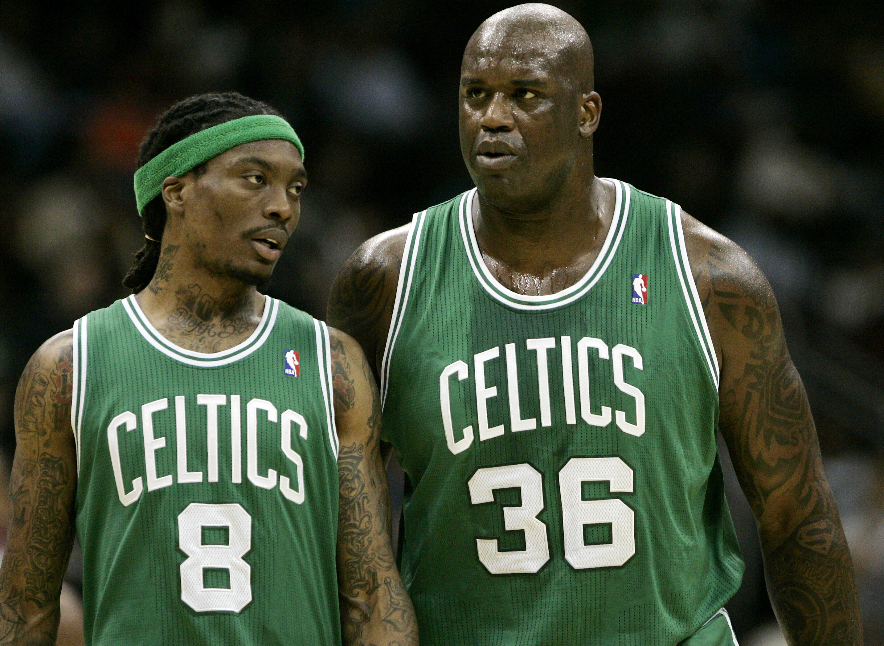 FILE - Boston Celtics' Marquis Daniels (8) and Shaquille O'Neal (36) walk onto the court after a time-out in the first half against the New Jersey Nets during an NBA basketball game at the Prudential Center in Newark , N.J., Sunday, Dec. 5, 2010. 