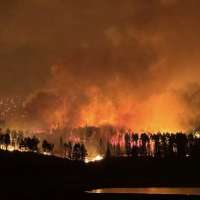 Firefighters focus on protecting structures after Monroe Canyon Fire doubles in size