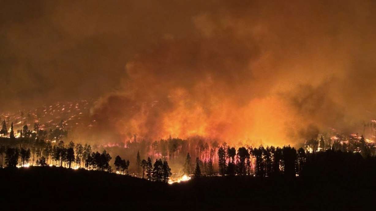 The Monroe Canyon Fire burns in Sevier County on Friday. The fire doubled in size over the weekend, and red flag weather conditions remain in place on Monday.