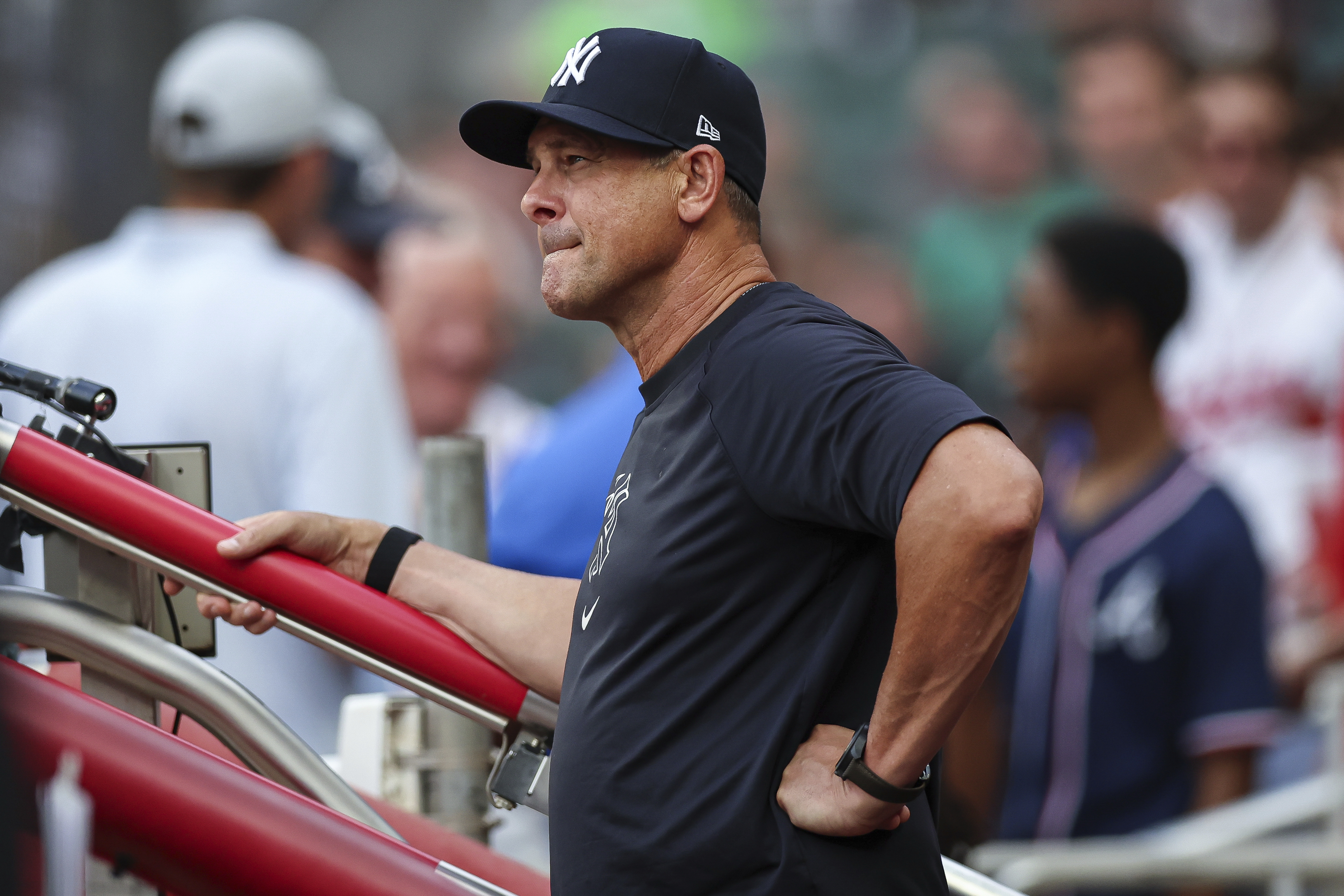 New York Yankees manager Aaron Boone reacts during the third inning of a baseball game against the Atlanta Braves, Friday, July 18, 2025, in Atlanta. 