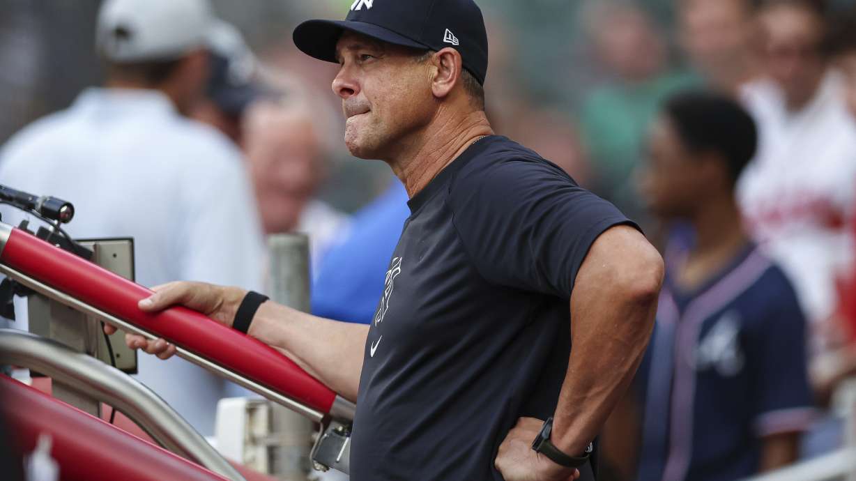 New York Yankees manager Aaron Boone reacts during the third inning of a baseball game against the Atlanta Braves, Friday, July 18, 2025, in Atlanta.