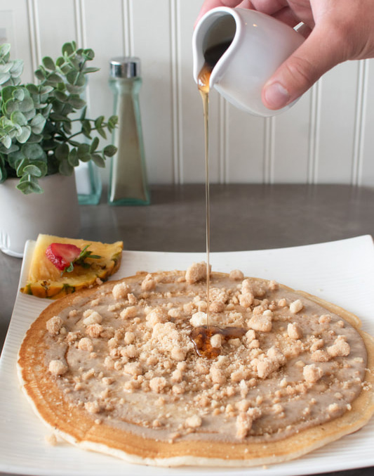 New restaurant in Downtown Daybreak offers a taste of the islands