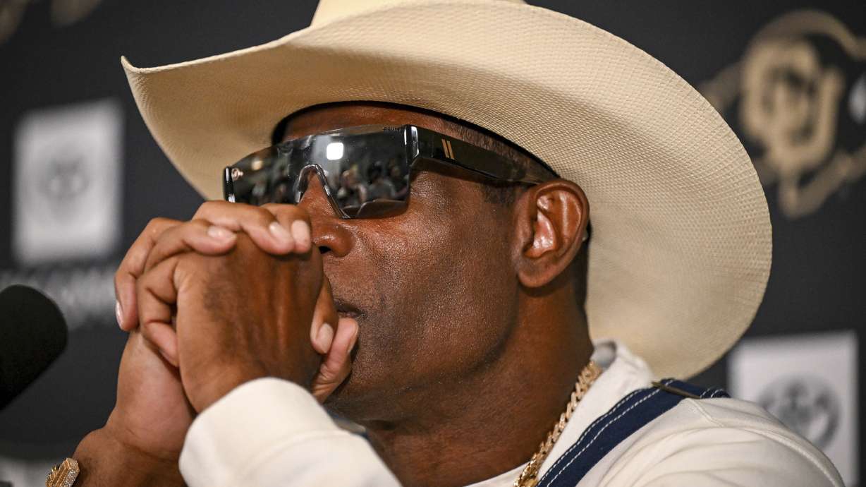 Colorado head coach Deion Sanders considers a question during a news conference to discuss his journey in beating bladder cancer Monday, July 28, 2025, in Boulder, Colo. /