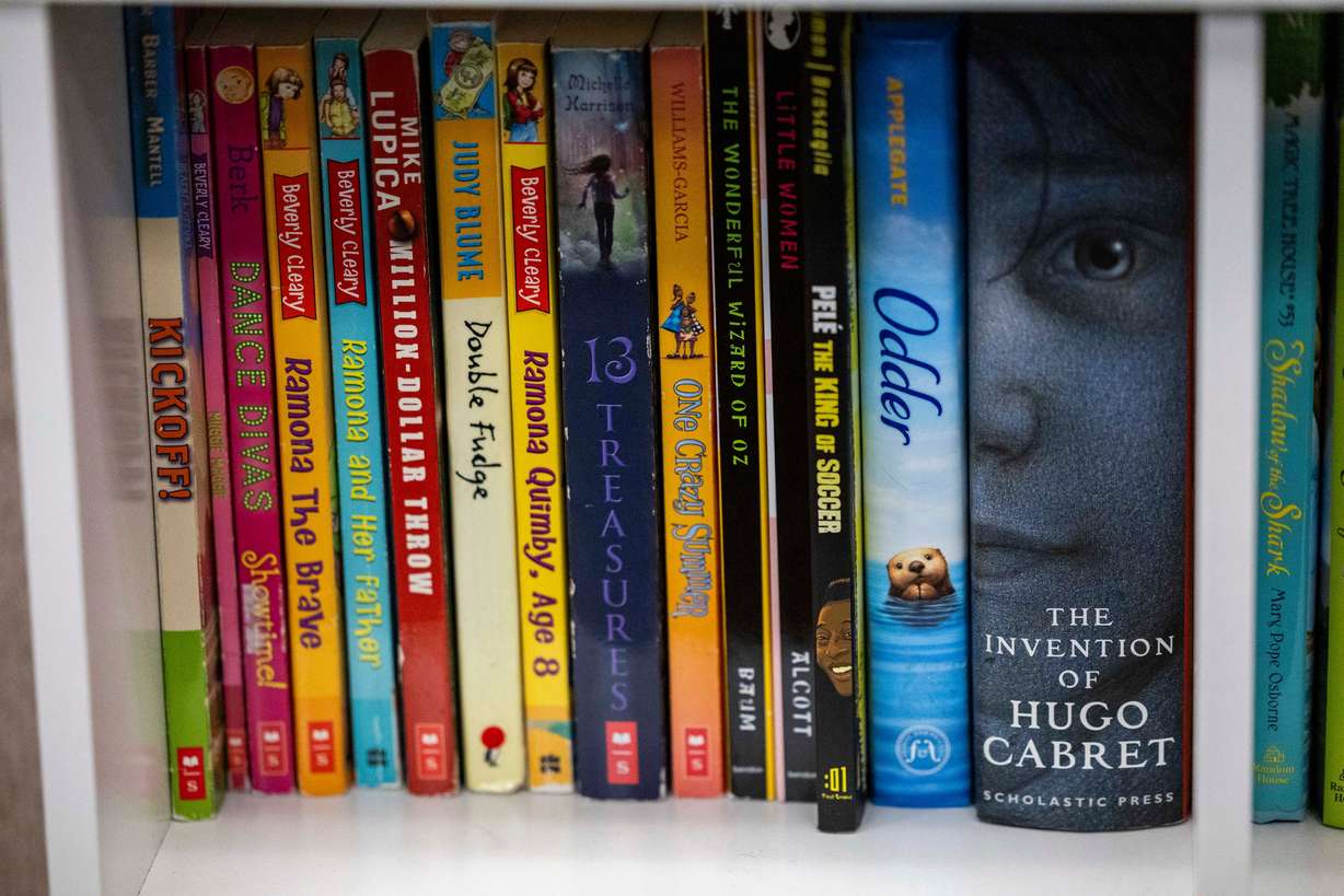Books on a bookshelf at Crescent Elementary School in Sandy on Jan. 13.