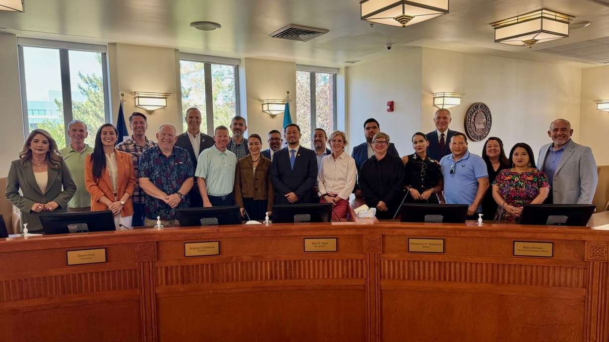 A contingent of six Guatemalan lawmakers traveled to Utah as part of a visit to the state hosted in part by Ogden officials. Members of the contingent pose with Ogden leaders in Ogden City Council chambers on July 22.