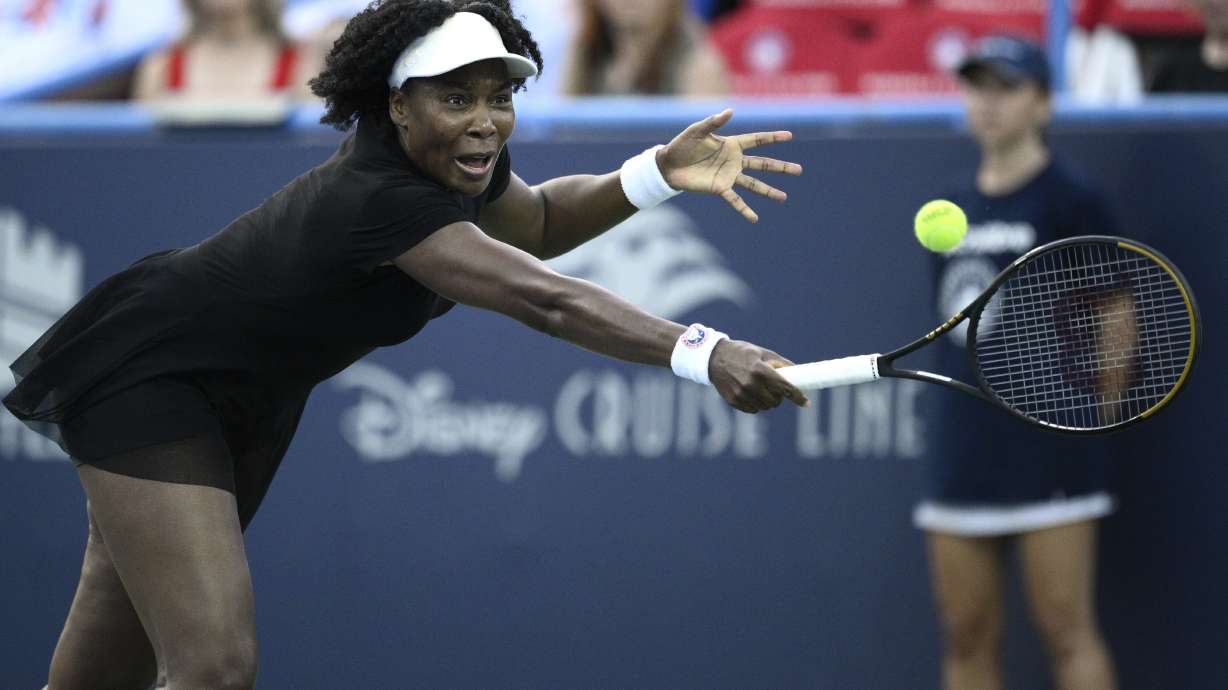 Venus Williams lunges for the ball during a match against Magdalena Frech, of Poland, at the Citi Open tennis tournament Thursday, July 24, 2025, in Washington.