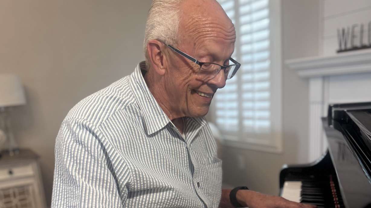 David Stephenson, 74, plays his piano at home. Stephenson, of Mesa, Ariz., has been serving as the “ward organist” in Latter-day Saint wards for 55 years.