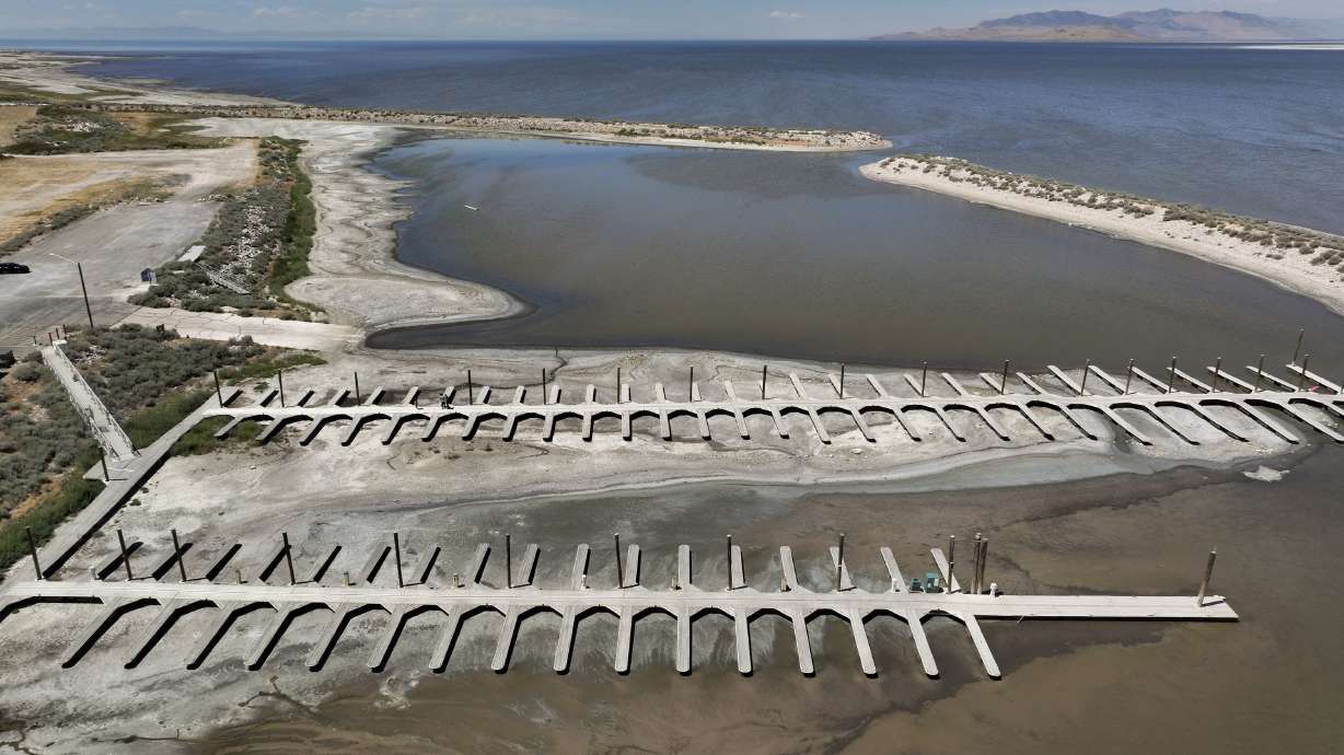 Boat docks are dried up and unusable at the Antelope Island Marina on Tuesday. Water levels in the Great Salt Lake are low during a sustained drought.