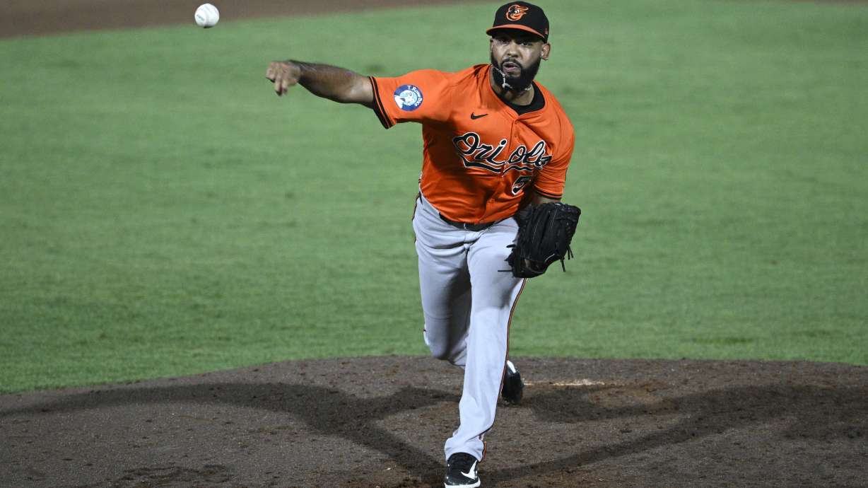 Baltimore Orioles pitcher Seranthony Domínguez throws to home plate during the eighth inning of a baseball game against the Tampa Bay Rays, Saturday, July 19, 2025, in Tampa, Fla.
