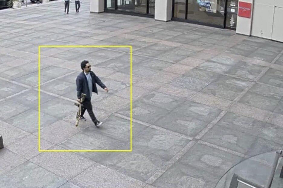 This image from surveillance video obtained by The Associated Press shows Shane Tamura outside a Manhattan office building on Monday, July 28, 2025 in New York. 