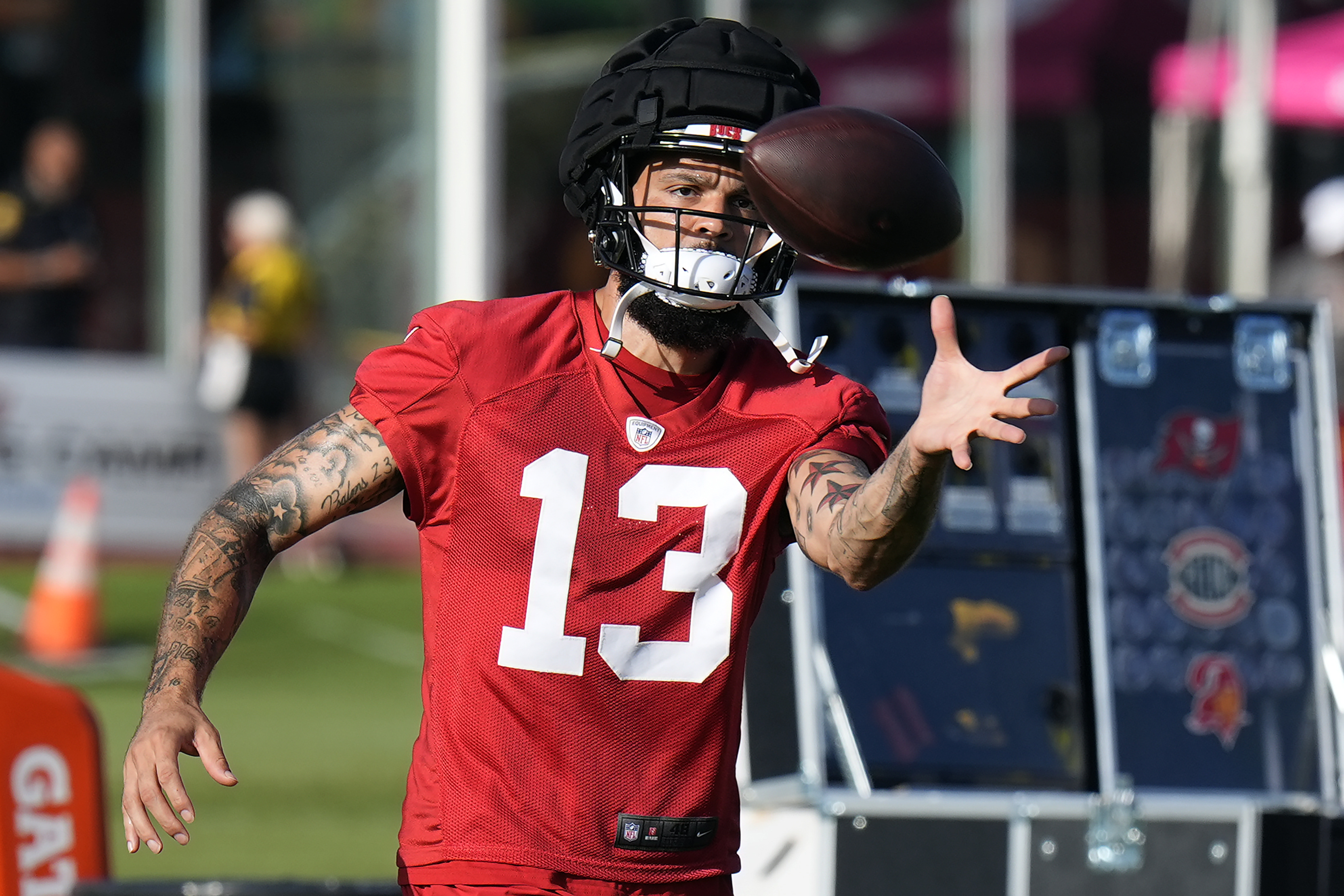 Tampa Bay Buccaneers wide receiver Mike Evans (13) makes a catch during practice at the team’s NFL football training camp, Friday, July 25, 2025, in Tampa, Fla.