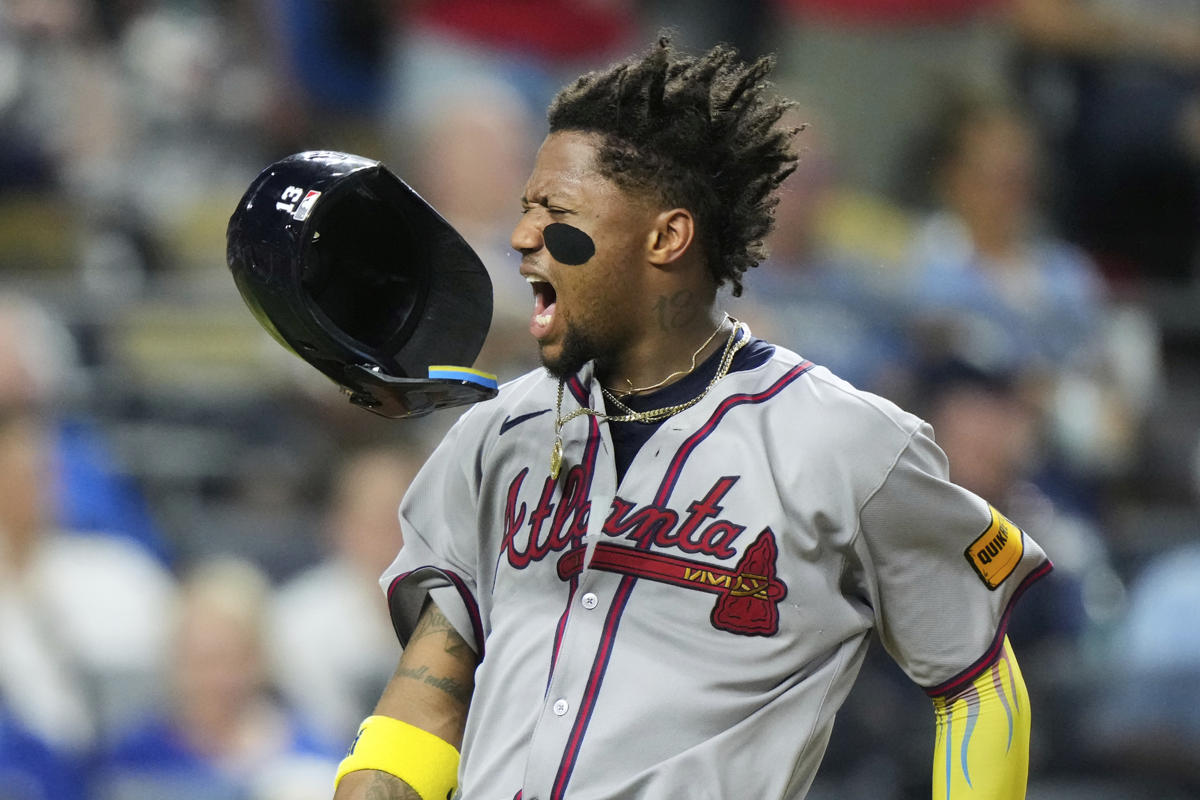Atlanta Braves' Ronald Acuna Jr. celebrates after scoring on a three-run double hit by Austin Riley during the eighth inning of a baseball game against the Kansas City Royals, Monday, July 28, 2025, in Kansas City, Mo. 