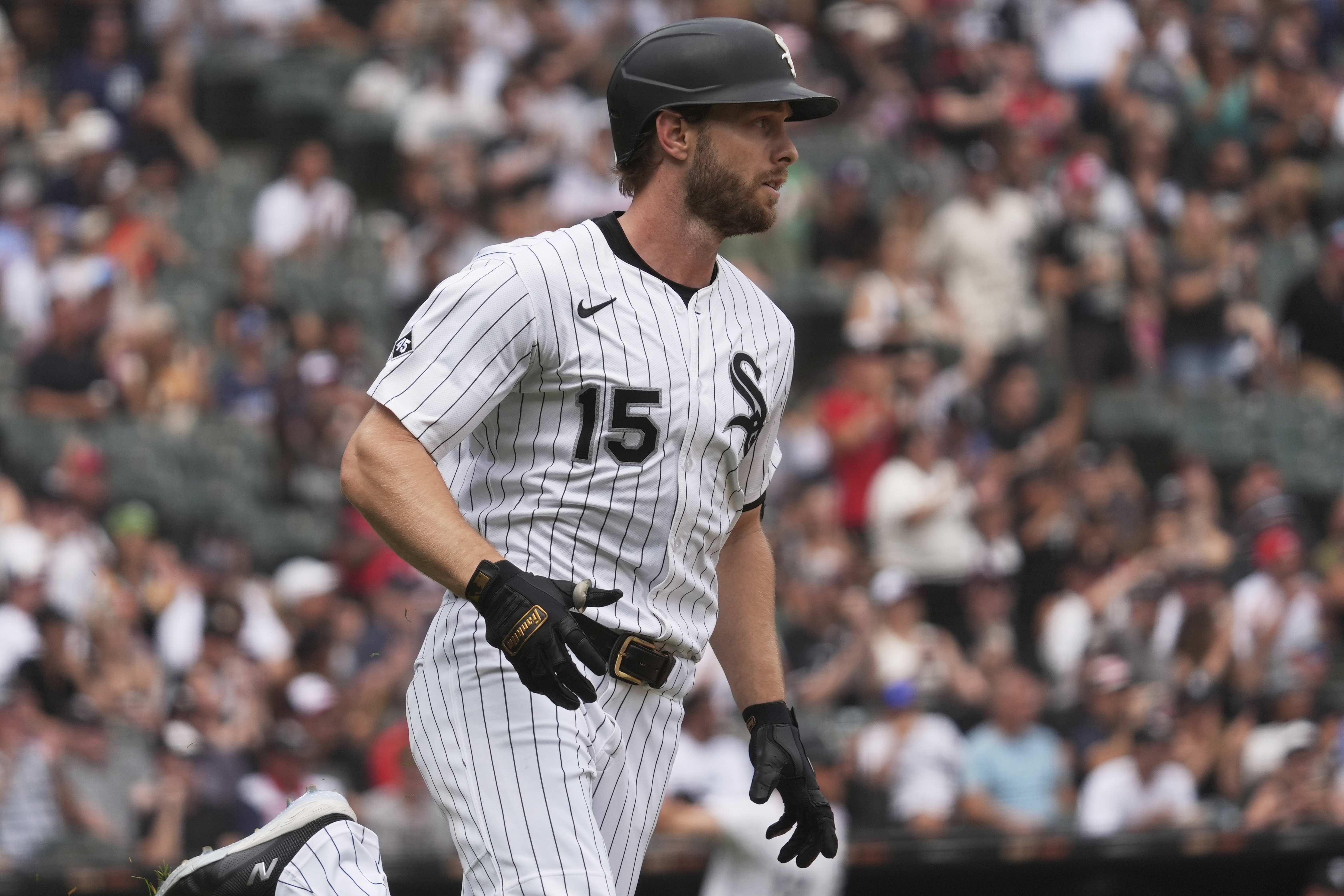 Chicago White Sox's Austin Slater runs after hitting a one-run single during the fifth inning of a baseball game against the Cleveland Guardians in Chicago, Sunday, July 13, 2025. 