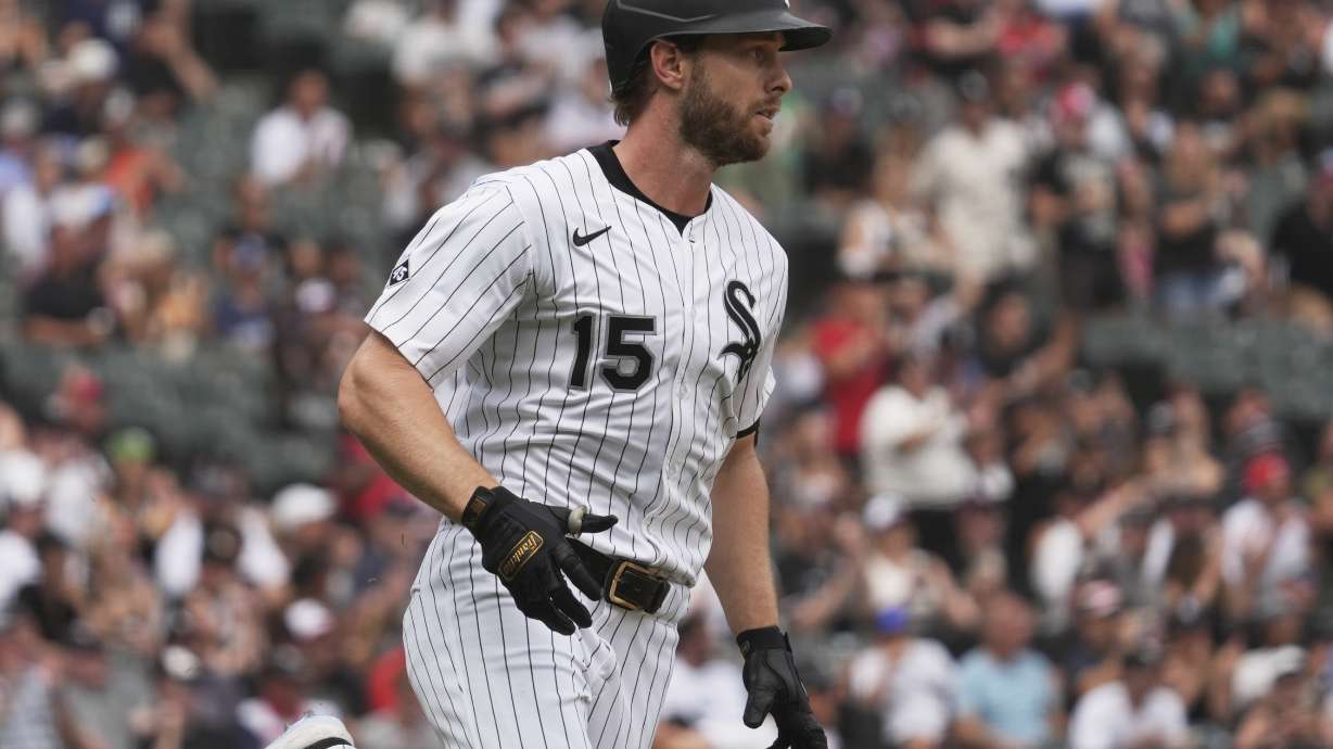 Chicago White Sox's Austin Slater runs after hitting a one-run single during the fifth inning of a baseball game against the Cleveland Guardians in Chicago, Sunday, July 13, 2025.