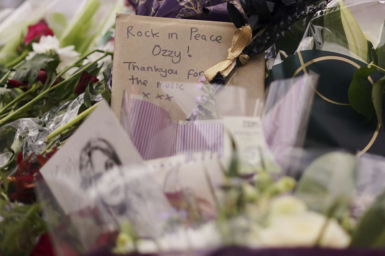 Tributes left to honor musician Ozzy Osbourne in Birmingham, England, Wednesday. Thousands of fans came to pay tribute to the Black Sabbath frontman, who passed away July 22.