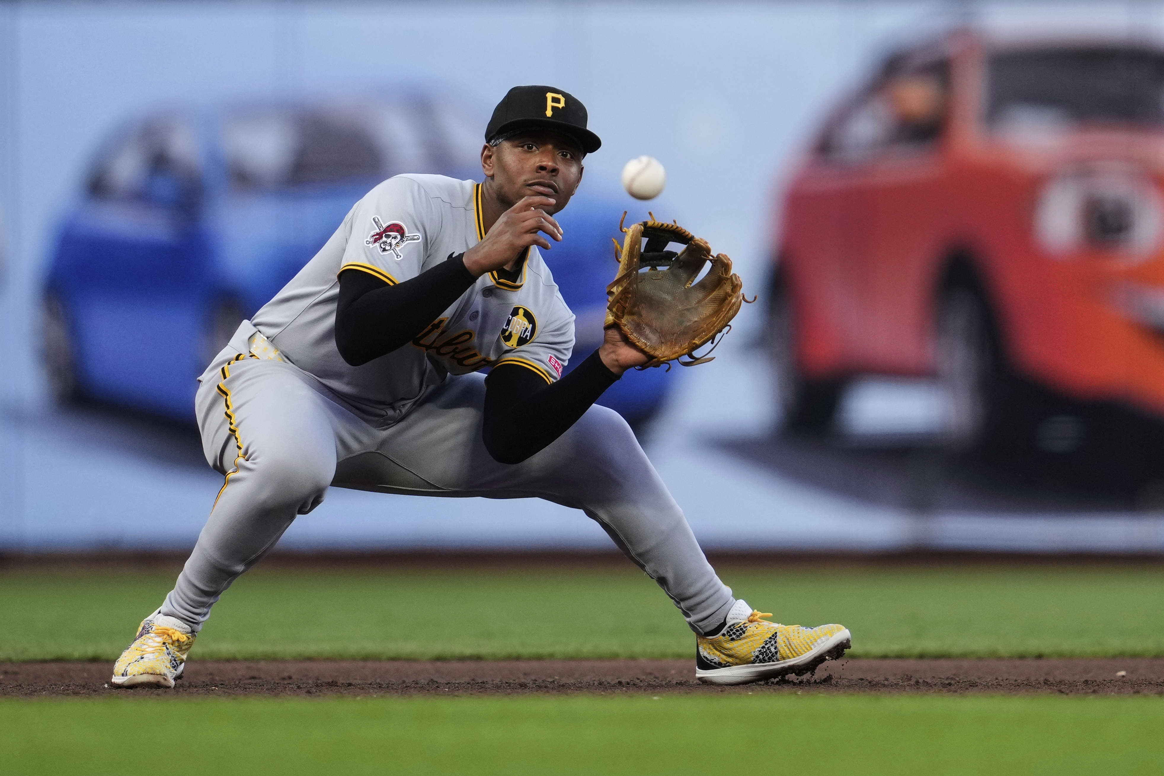 Pittsburgh Pirates third baseman Ke'Bryan Hayes catches a line drive hit by San Francisco Giants' Wilmer Flores during the fourth inning of a baseball game Tuesday, July 29, 2025, in San Francisco. 