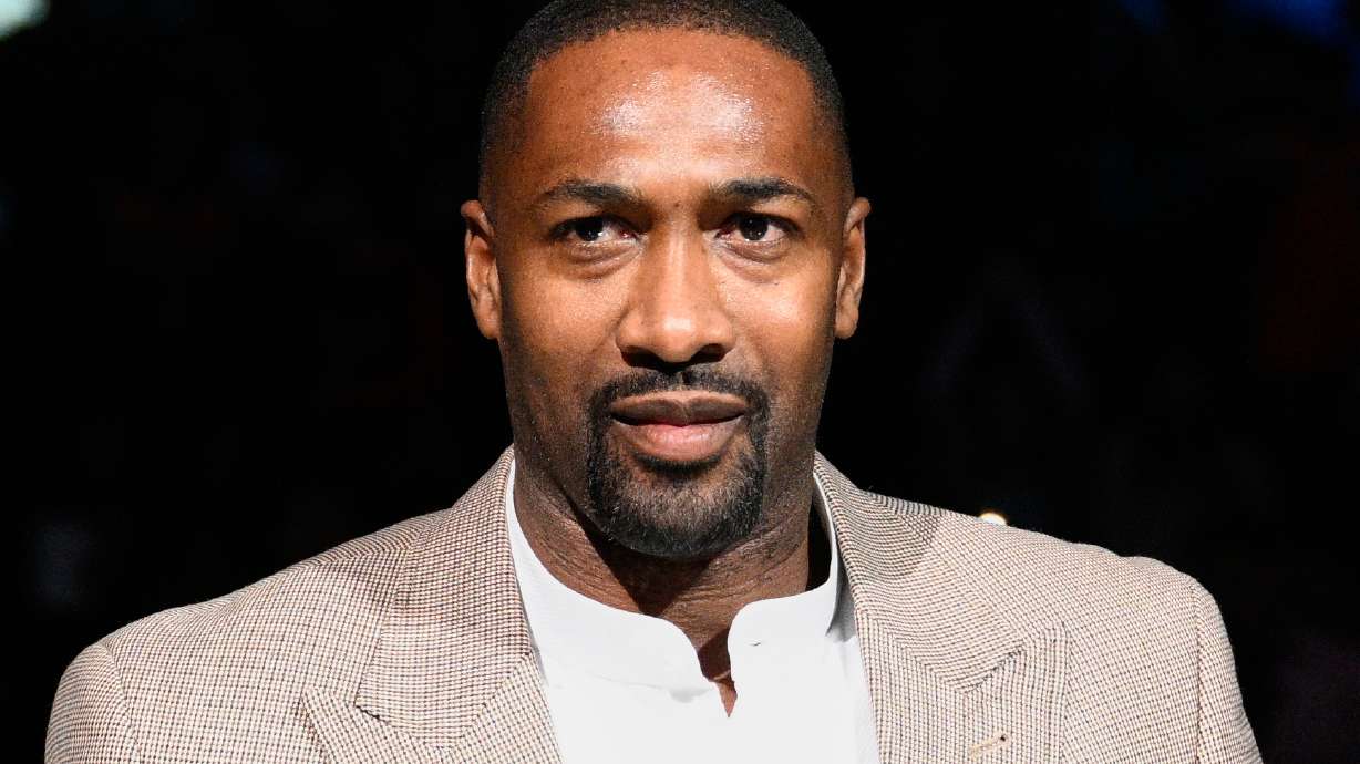 FILE - Former Washington Wizards player Gilbert Arenas takes part in a ceremony during the half-time of an NBA basketball game between the Wizards and the Miami Heat, Friday, Nov. 18, 2022, in Washington.