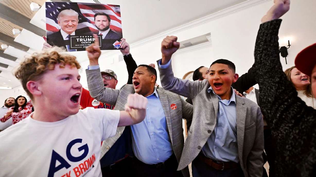Utah Republican Party supporters cheer as it is announced that former President Donald J. Trump would win the presidency as they gather in Draper for an election party on Nov. 5, 2024.