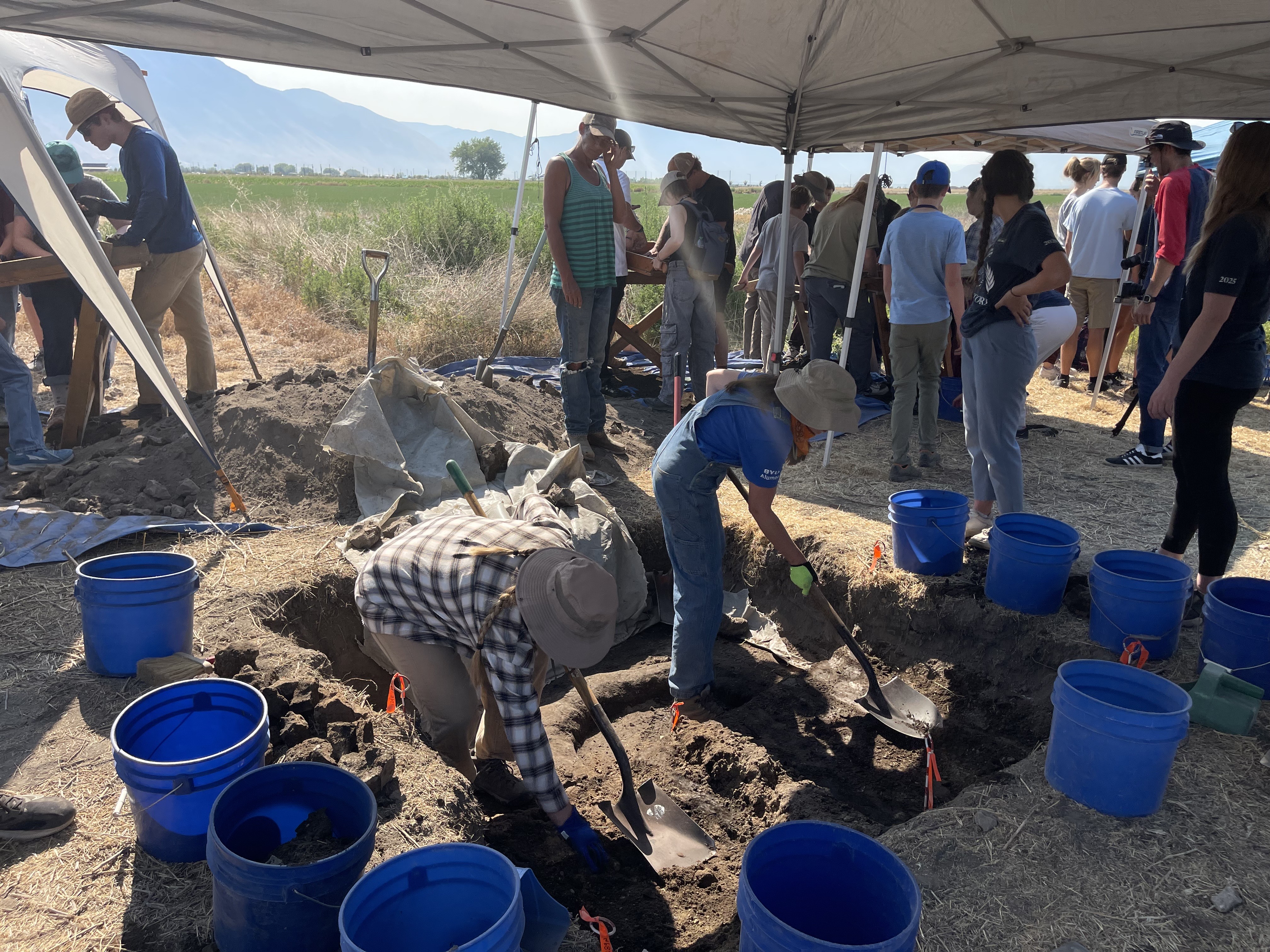 Brigham Young University students participate in an excavation at the Hinckley Mounds archaeological site in west Provo during the university's Young Historian Camp on Wednesday.