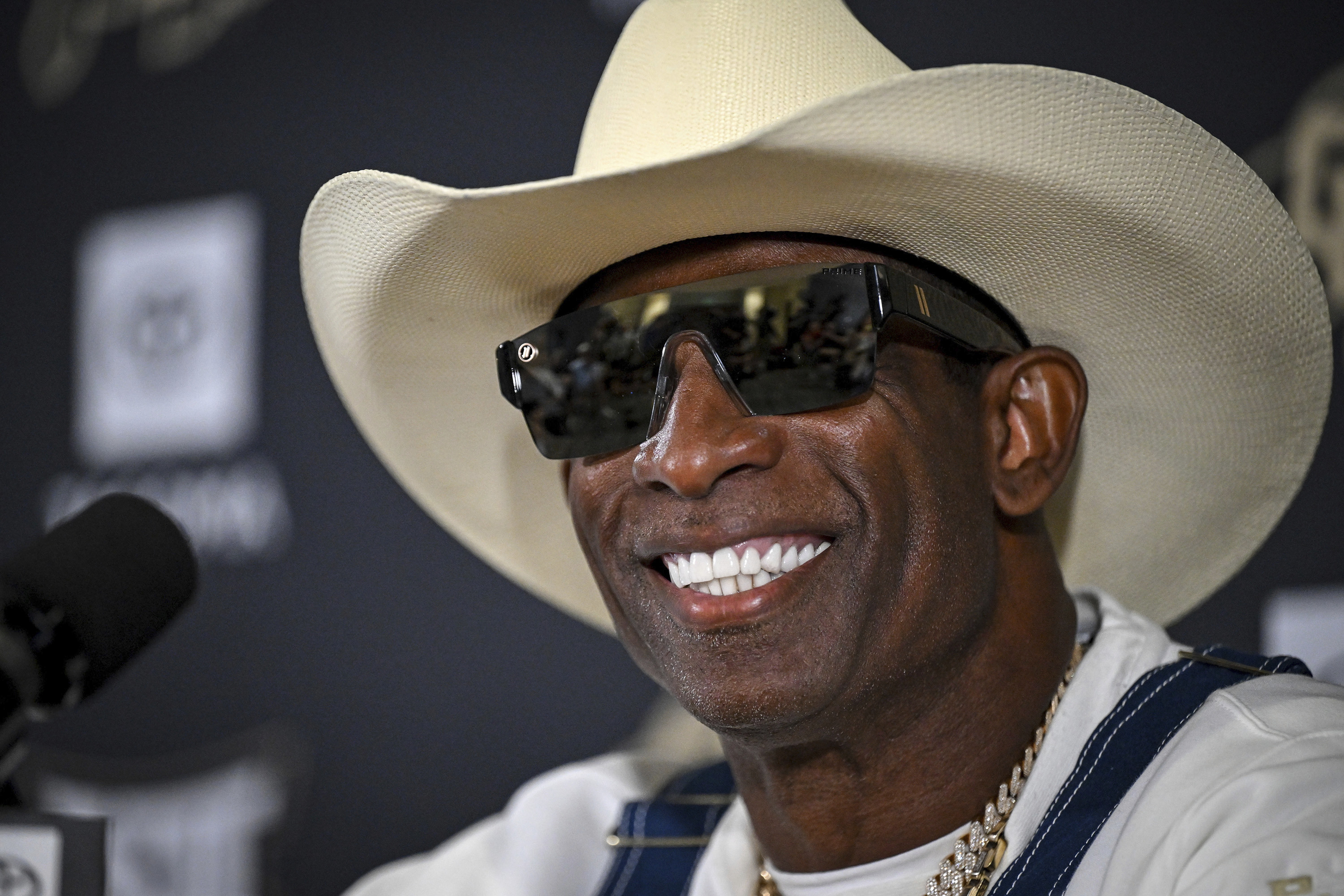 Coach Deion Sanders' return to Colorado lifts team spirits after his battle with bladder cancer