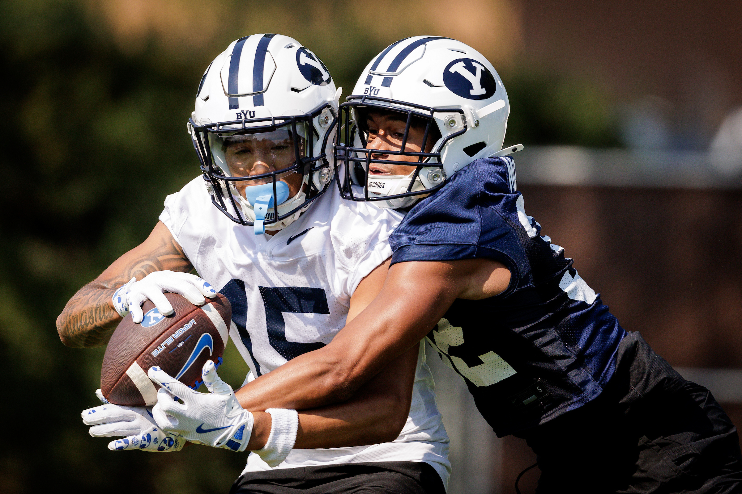Eyes on quarterbacks, but defense impresses as BYU opens training camp