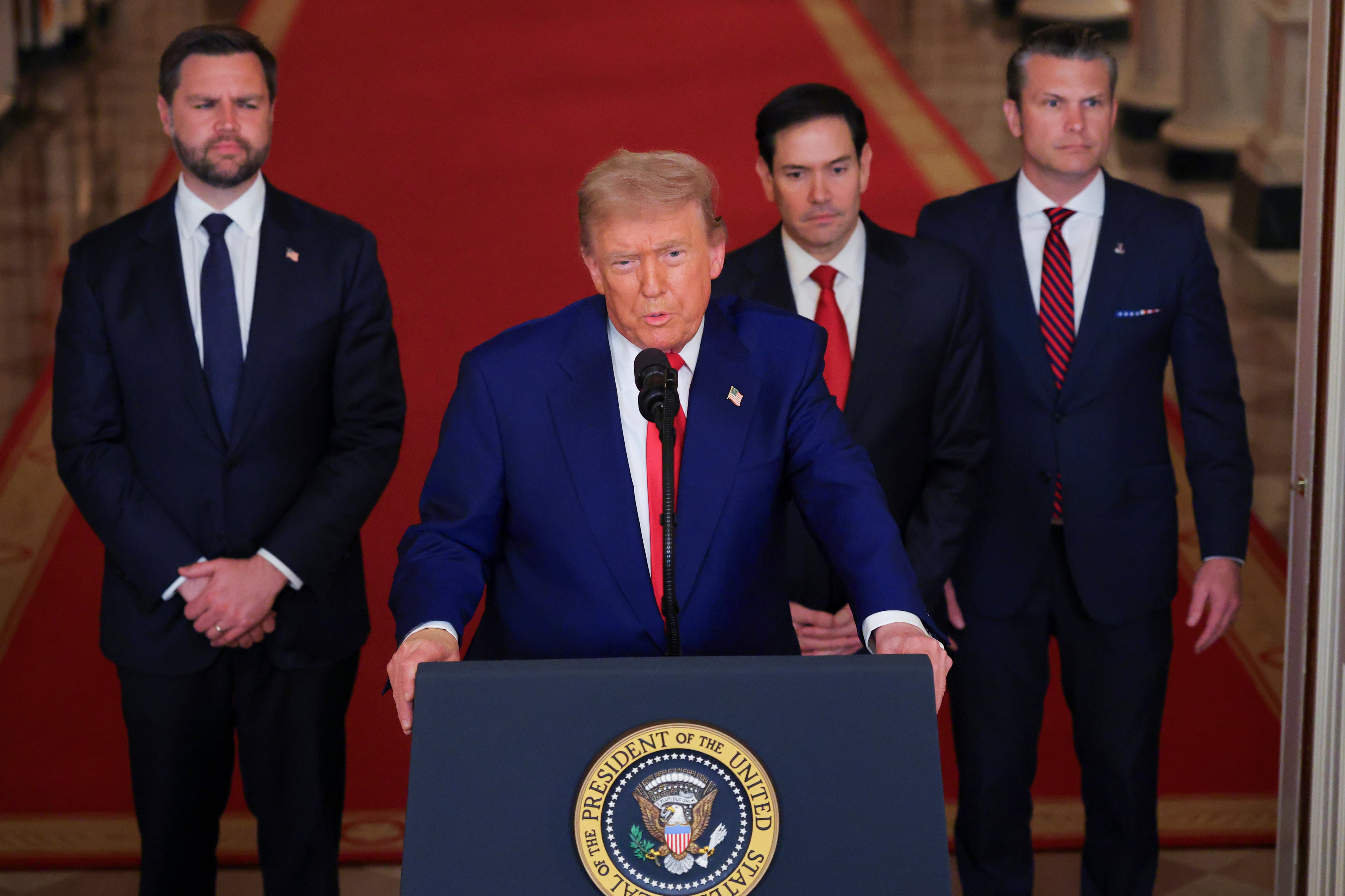 President Donald Trump speaks from the East Room of the White House in Washington, June 21, after the U.S. military struck three Iranian nuclear and military sites, directly joining Israel's effort to decapitate the country's nuclear program, as Vice President JD Vance, Secretary of State Marco Rubio and Defense Secretary Pete Hegseth listen.