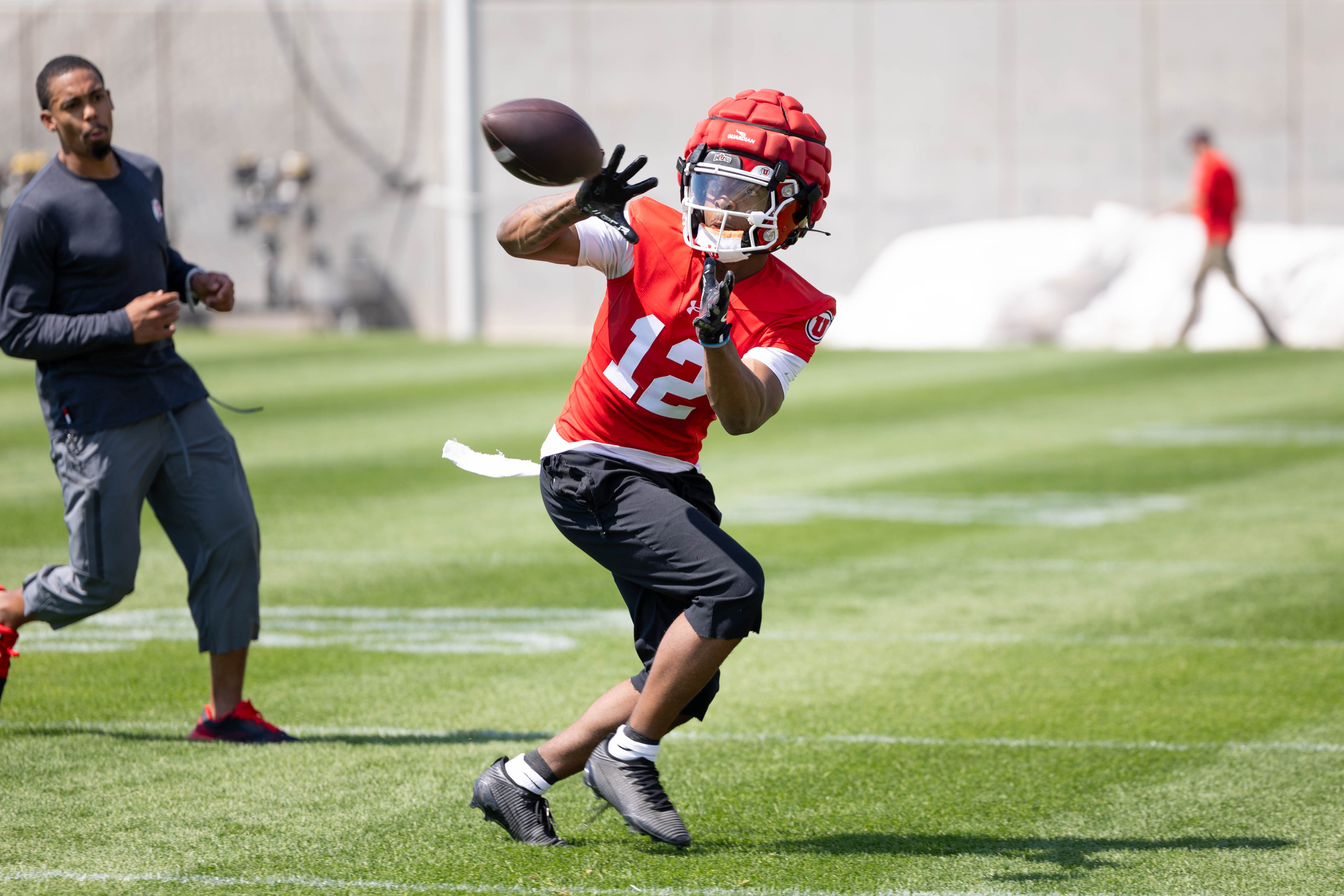 Utah receiver Larry Simmons catches a pass during the first day of fall camp on July 30, 2025.