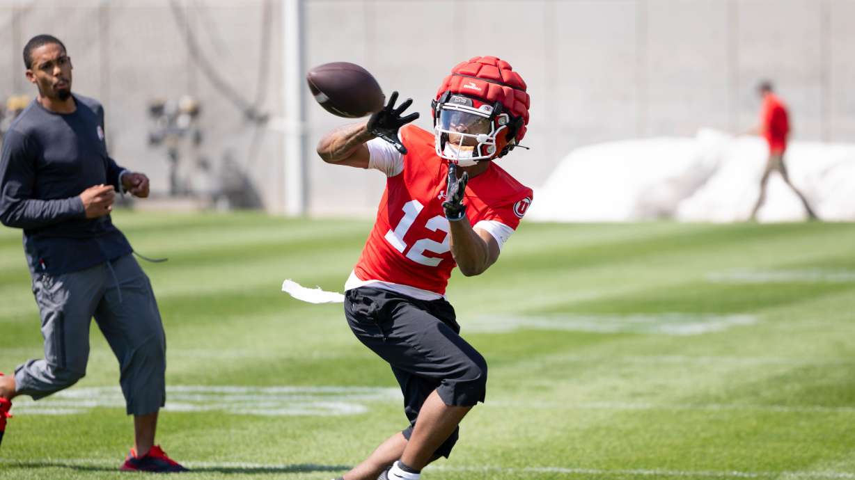 Utah receiver Larry Simmons catches a pass during the first day of fall camp on July 30, 2025.